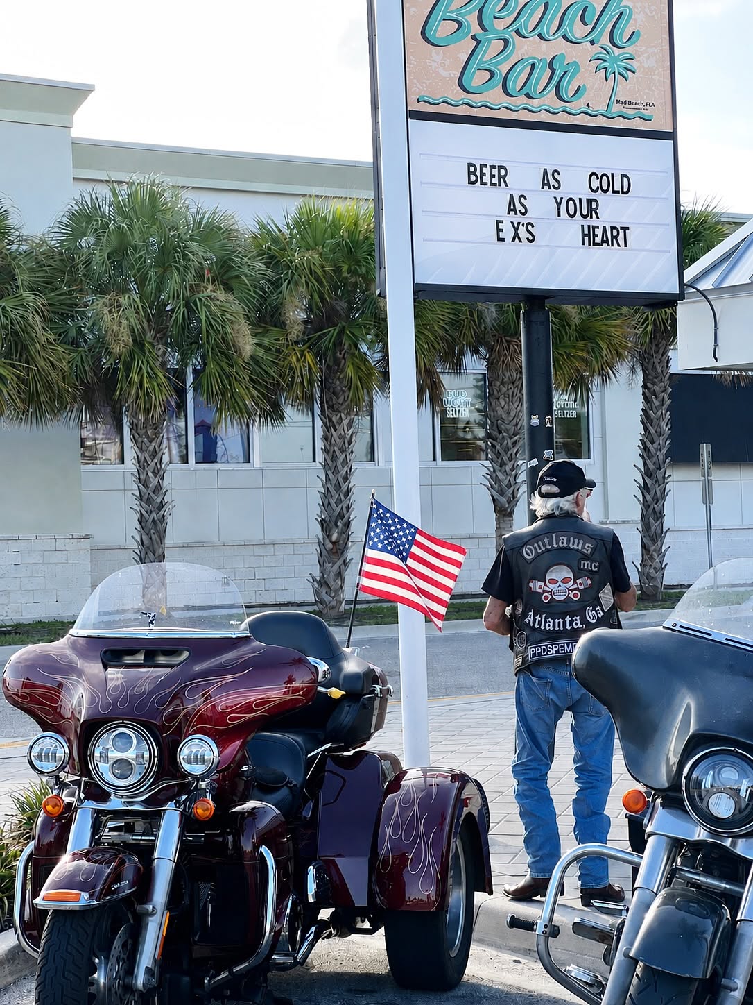 Beach Bar marquee: Beer as cold as your ex's heart, with motorcycles out front