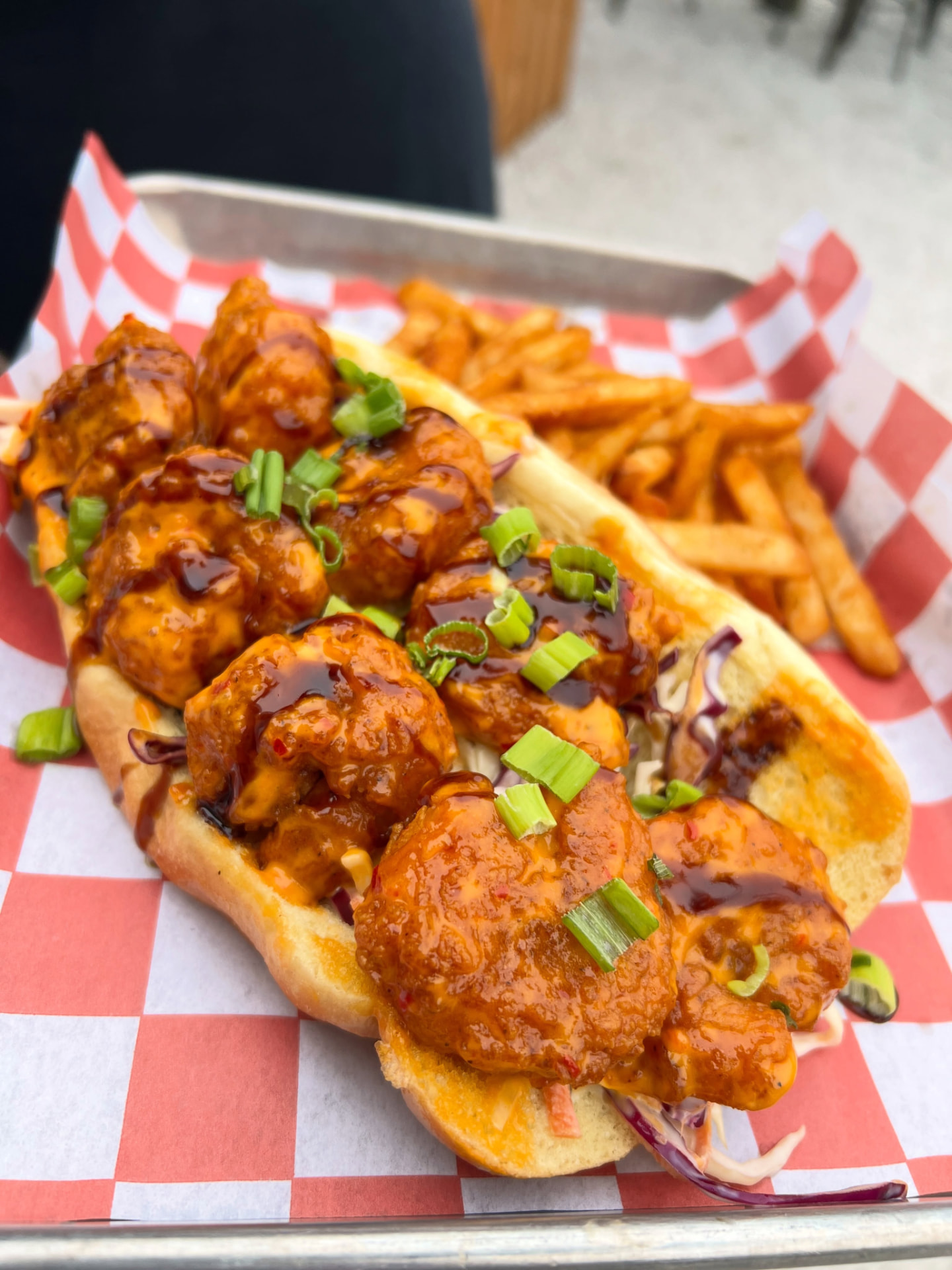 Saucy shrimp po-boy with seasoned fries